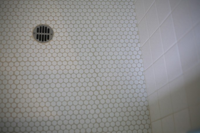 penny tile white shower floor