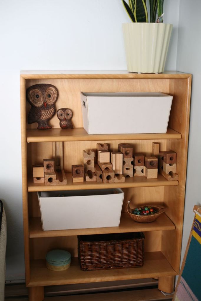 Blond wood shelf toys