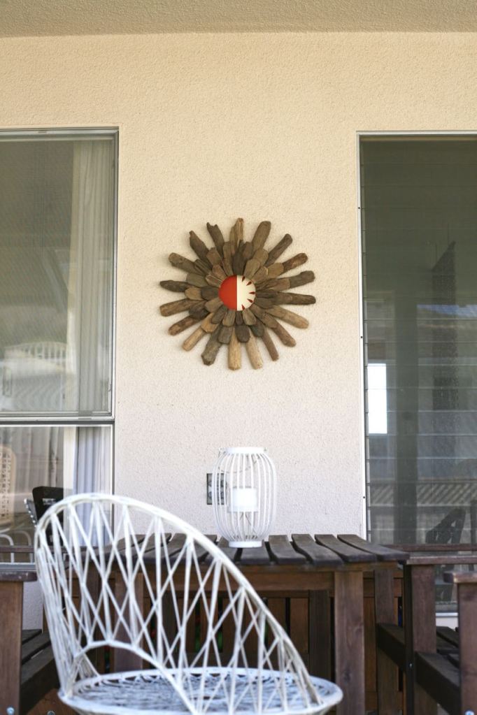 driftwood starburst painting woodard spun fiberglass chair patio