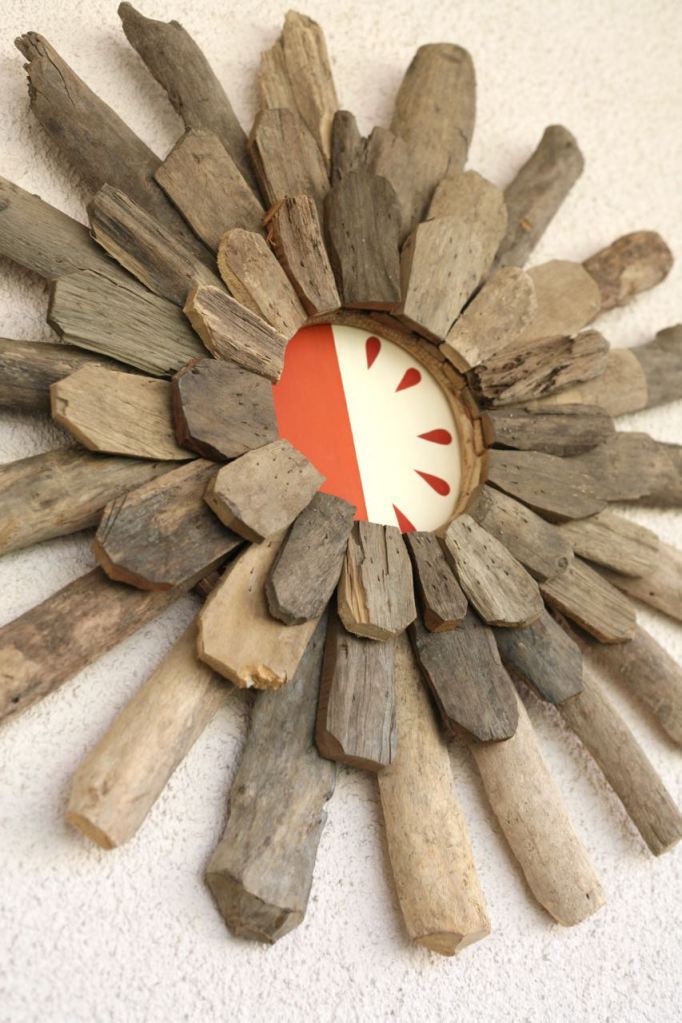 diy teardrop driftwood starburst wall hanging painting covering hole in wall stucco patio 