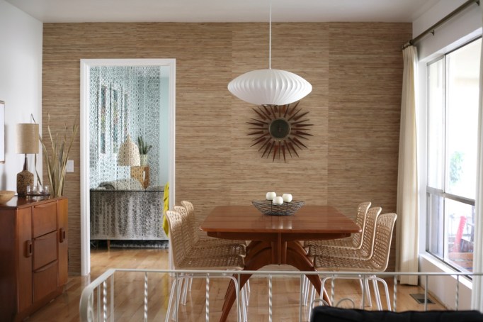 mid century dining room grasscloth wallpaper starburst clock nelson bubble light heywood wakefield wishbone table
