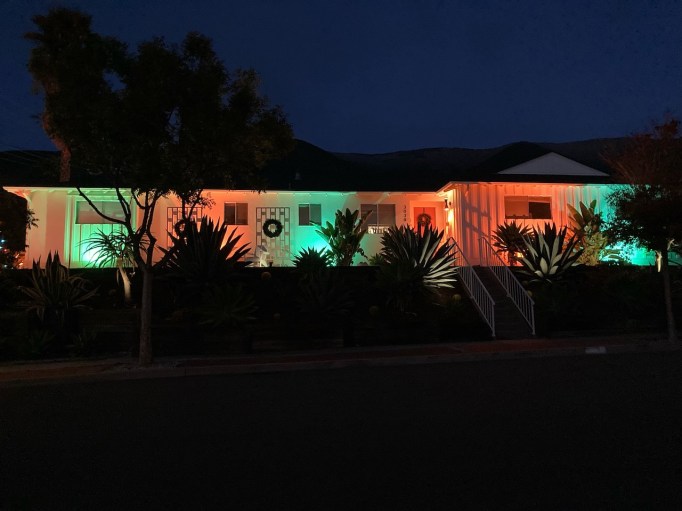 outdoor christmas flood lights in red and green